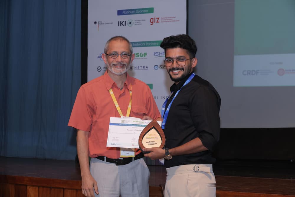 Ruman Madambi receiving the Young Researcher Award at Energise 2025